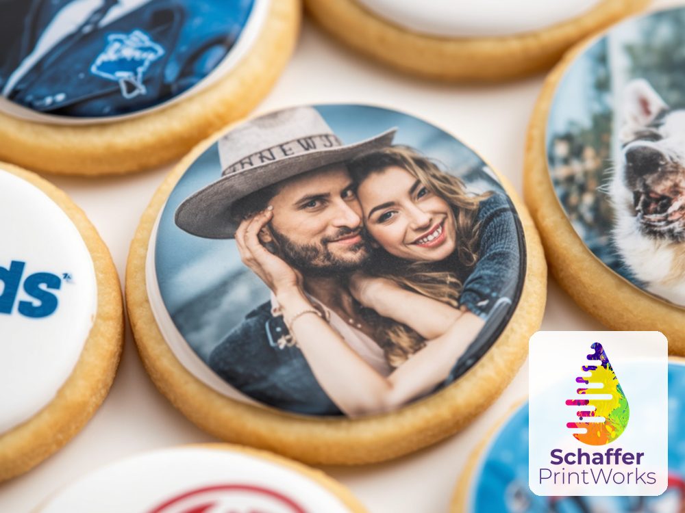 Sugar cookies topped with round edible image prints of photos and logos